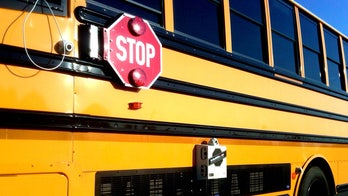 Stop-arm cameras taking drivers to school over bus route rules