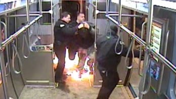 Chicago train passenger sets fire during arrest in dramatic video