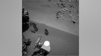 Yum! Curiosity rover eats Mars dirt, finds odd bright stuff