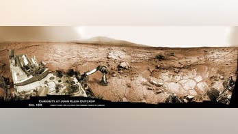 Stunning Mars panorama captures Curiosity rover at work