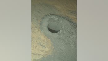 Mars rover sets out to solve red planet's environmental mysteries