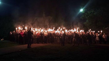 Charlottesville protest: Torch-wielding group rallies against Virginia Confederate statue removal