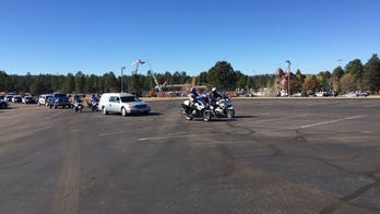 Hundreds attend funeral for Arizona officer shot dead outside restaurant