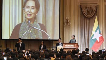 Suu Kyi in Japan as Myanmar faces pressure on Rohingya