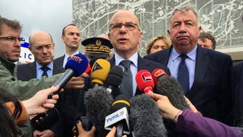 The Latest: Sources;police killer had previous conviction