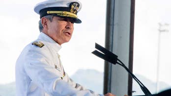 Commander backs standing for national anthem at Pearl Harbor