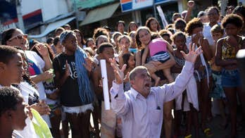 Rio slum dwellers protest deadly gang, police gunbattles