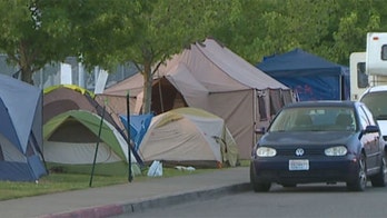 Protesters burn American flag outside Washington state detention center, ordered to vacate