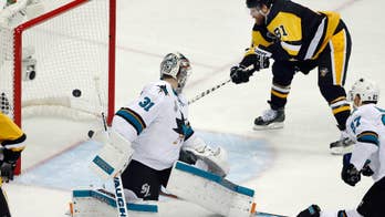 The Latest: Sharks score late in 3rd to tie Game 2