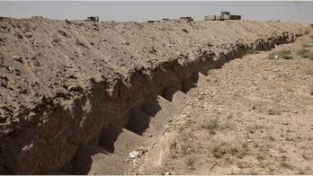 AP EXCLUSIVE: Iraq digs security trench around Fallujah