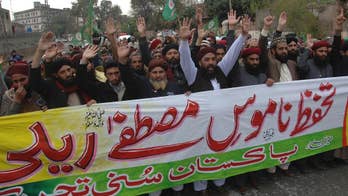 Violence at Pakistan rally in support of blasphemy laws