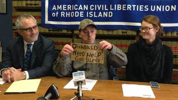 Man sues over panhandling citation; ACLU says cheerleaders, firefighters haven't been cited