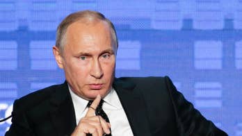 Putin says militants in Aleppo use civilians as shields