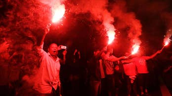 Brazil: Pro-Rousseff protesters march toward TV Globo