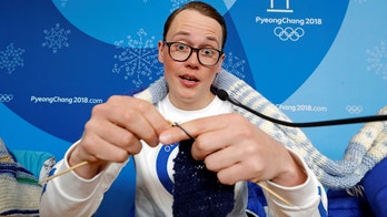 Finnish snowboarding coach knits mid-Olympics, Twitter goes wild