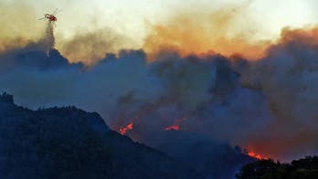 Fires threatening communities around West