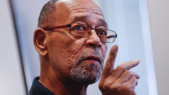 Cross-burning victims wonder why priest is confessing now