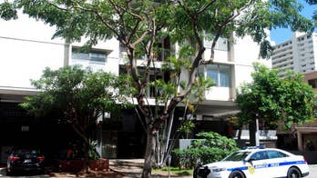 The Latest: Human remains removed from Waikiki apartment