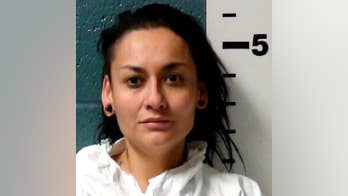 New Mexico police: Woman cut, stabbed her boyfriend in car