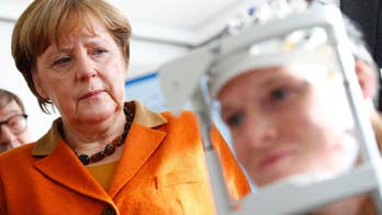 German, Chinese leaders stress commitment to free trade