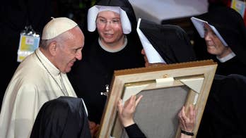 The Latest: Francis calls for churchmen to tend to the needy