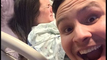 Reddit user posts smiling selfie during wife's labor