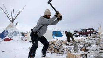 North Dakota borrows $7M more for pipeline protest costs