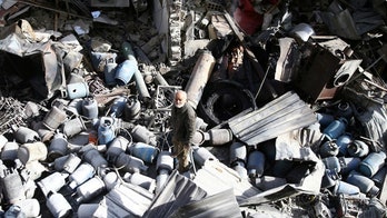 Government attacks outside Damascus kill 19, Syrian activists say