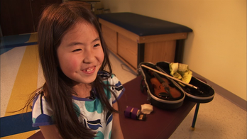 Georgia siblings with disabled dominant hands play adapted musical instruments