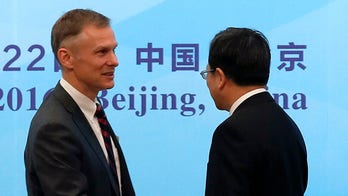Top-ranking US diplomat in China resigns after Trump rejects climate treaty