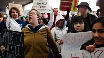 With students stranded abroad, colleges condemn travel ban