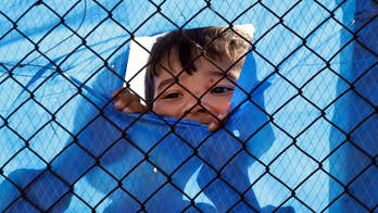 Greece pauses deportations as thousands claim asylum