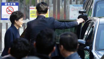 S. Korea's Park says 'sorry' as she undergoes questioning