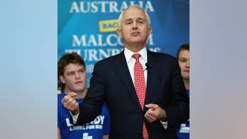 Australians head to the polls in tight election contest