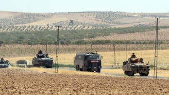 The Latest: US calls on Turkey, Syria Kurds to halt clashes