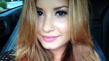 Demi Lovato Changes Look, Remembers Whitney Houston