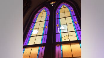 Photos: Vandal smashes windows of Denver's oldest active church
