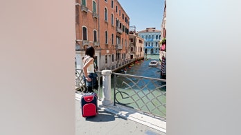 Venice won't ban wheelie suitcases-- yet