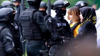 Suspects charged with murder in airport nerve agent attack