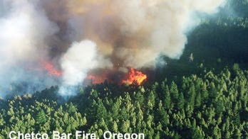 Wildfire burns 3 homes in southwestern Oregon