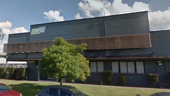 Worker trapped in massive 'hot' ink tank dies