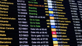 Technical difficulty at London's Gatwick Airport forces staff to write flight info on whiteboards