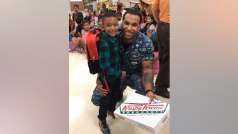 Military dad surprises young son at school