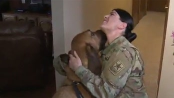 Army private reunited with dog after court battle