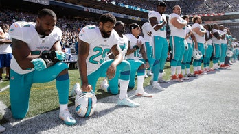 Miami Dolphins players who stage anthem protests could face game suspensions, report says