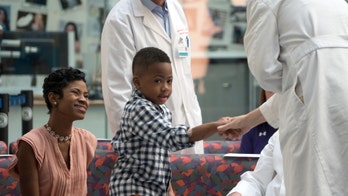 Boy with double-hand transplant's next goal: play football