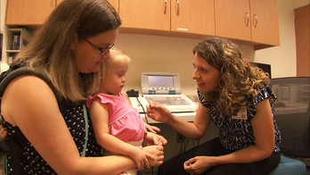 Tiny hearing aids help Georgia toddler with Down syndrome hear