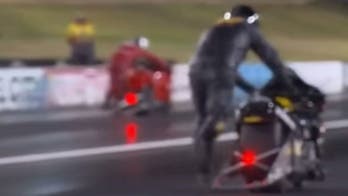 Drag racers push their broken-down bikes to the finish in wild race