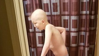 Mom shares heartbreaking photo of 10-year-old son fighting cancer