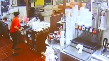 Armed customer thwarts restaurant robbery